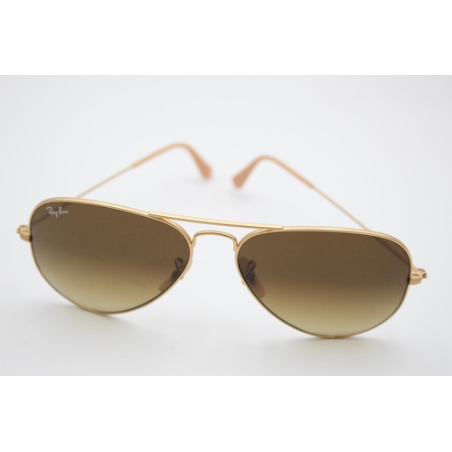 325 - A pair of Ray-Ban gold tone aviator woman's sunglasses with case