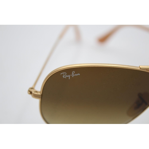 325 - A pair of Ray-Ban gold tone aviator woman's sunglasses with case