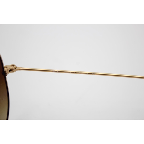 325 - A pair of Ray-Ban gold tone aviator woman's sunglasses with case