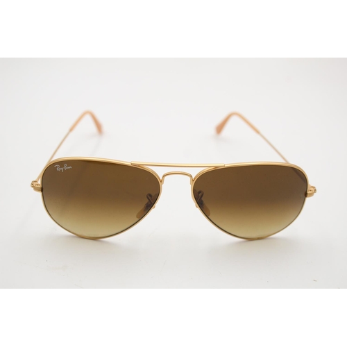 325 - A pair of Ray-Ban gold tone aviator woman's sunglasses with case