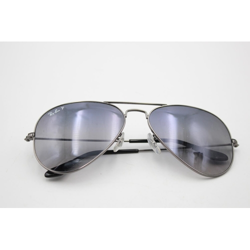 328 - A pair of Ray-Ban black framed aviator style sunglasses with polarized lenses and case