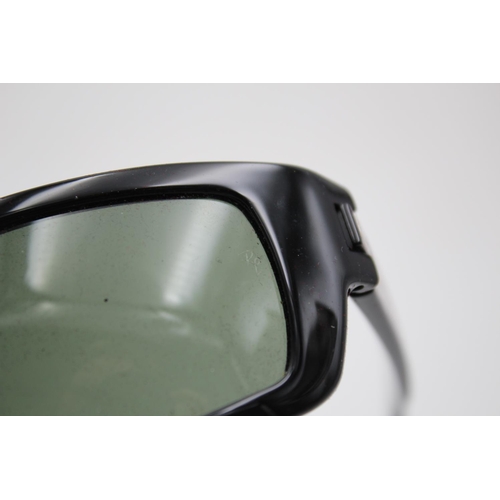 329 - A pair of Ray-Ban black framed sport's style visor sunglasses and case