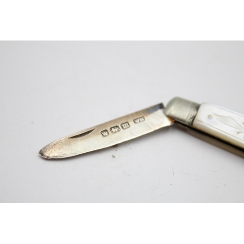 377 - Two antique hallmarked .925 sterling silver knives with mother of pearl handles - approx. gross weig... 