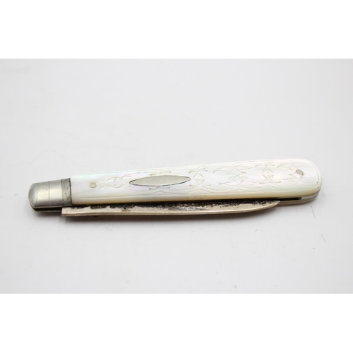 377 - Two antique hallmarked .925 sterling silver knives with mother of pearl handles - approx. gross weig... 