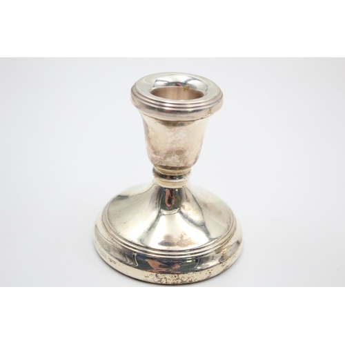 379 - Two hallmarked London silver filled squat candlesticks, dated 2001 - approx. 8.5cm high