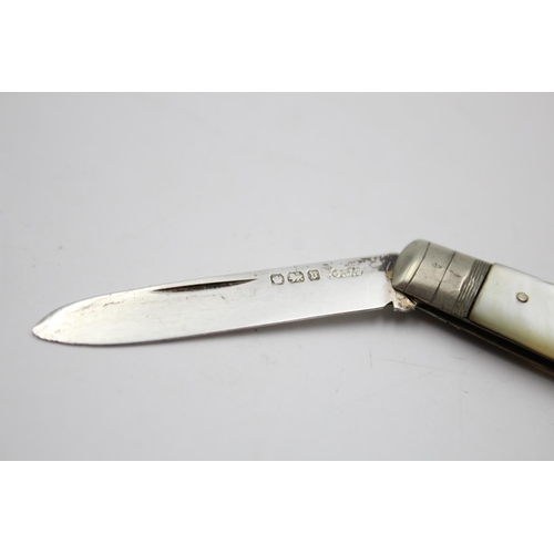 390 - Two antique hallmarked .925 sterling silver knives with mother of pearl handles - approx. gross weig... 