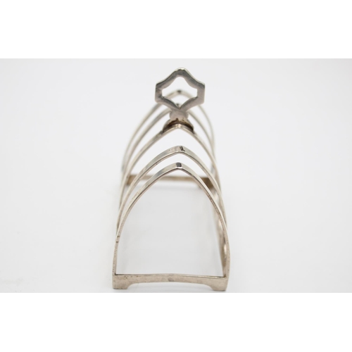 395 - A vintage Viners Ltd. hallmarked Sheffield silver five bar toast rack, dated 1934 - approx. gross we... 