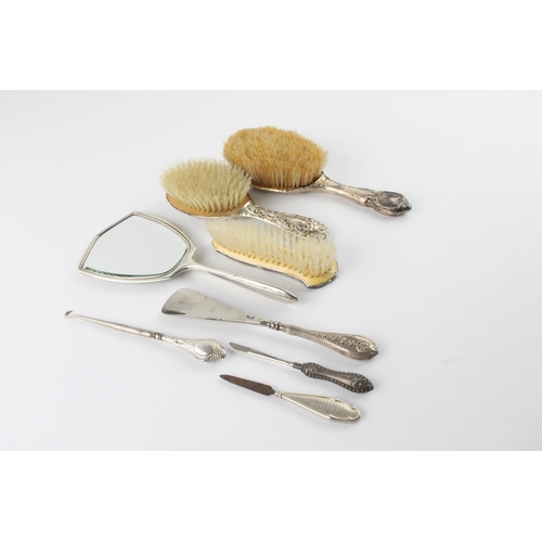 398 - Eight antique hallmarked .925 sterling silver ladies vanity items to include brushes, mirror, handle... 