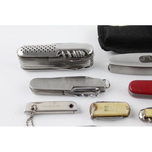 404 - Sixteen assorted pocket knives/tools to include Swiss army, multi-tool etc.