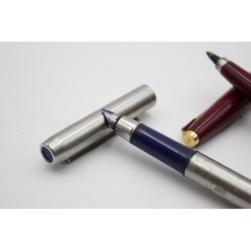 412 - Five assorted Parker fountain pens