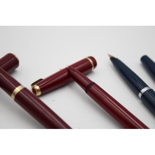 412 - Five assorted Parker fountain pens