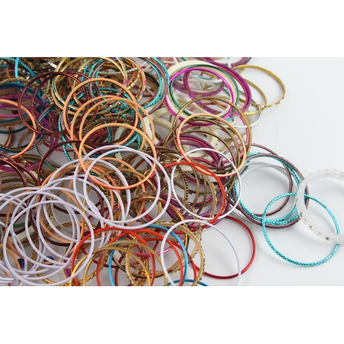 563 - Approx. 2kg of vintage Eastern Tradition stacker bangles