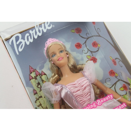 604 - Two Barbie dolls, one Sleeping Beauty and one Timeless Silhouette