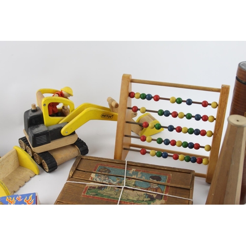 611 - A collection of assorted wooden toys and games to include kaleidoscope, abacus, puzzle etc.