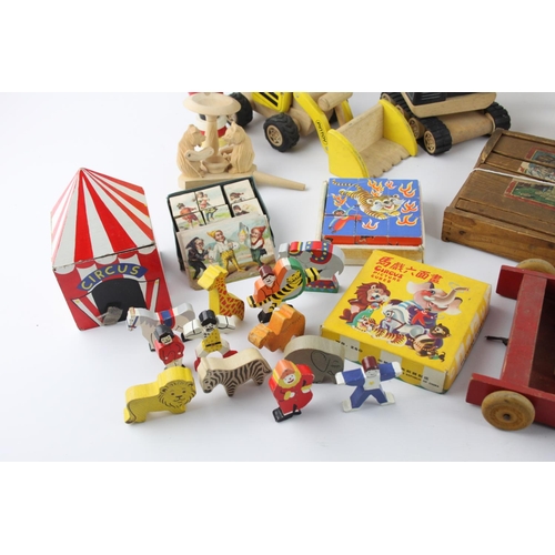 611 - A collection of assorted wooden toys and games to include kaleidoscope, abacus, puzzle etc.