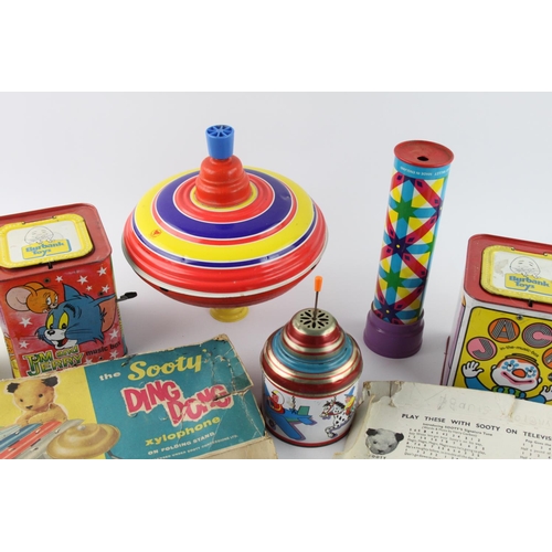 619 - A collection of assorted vintage tinplate toys to include Xylophone, Chad Valley, Disney etc.