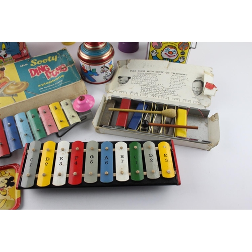 619 - A collection of assorted vintage tinplate toys to include Xylophone, Chad Valley, Disney etc.