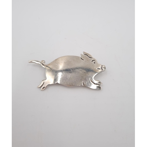 186 - Three pin brooches, 925 silver pig, 925 silver cats and white metal