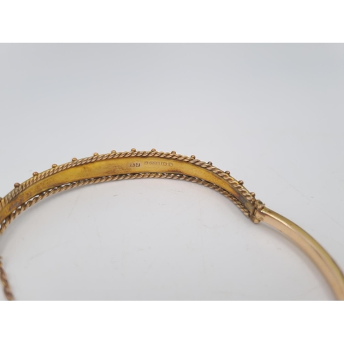 212 - A cased Edwardian hallmarked Birmingham 9ct gold bangle, dated 1901 - approx. gross weight 7.8 grams