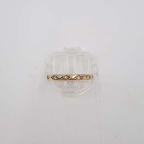 214 - A 9ct gold clear gemstone eternity ring, size O - approx. gross weight 2.2 grams