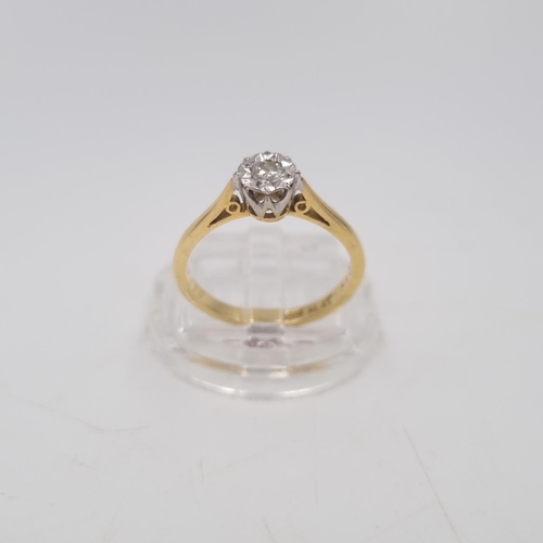 216 - An 18ct gold and platinum diamond solitaire ring, size L½ - approx. gross weight 2.58 grams