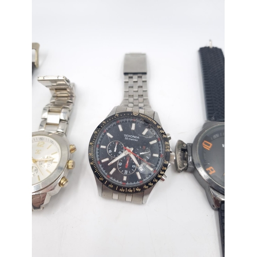 247 - Four assorted men's wristwatches, one Henley, one Charming Charlie, one Sekonda and one Diesel