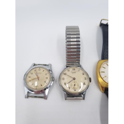 248 - Four vintage men's watches, one Buren Grand Prix hand wind, one Seiko 17 Jewels automatic, one Limit... 