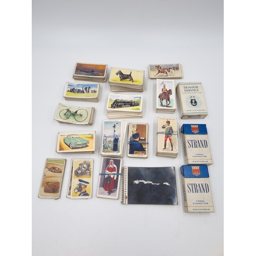 306 - A collection of antique and vintage collector's cards to include Wills's Railways Equipment, Mornfla... 