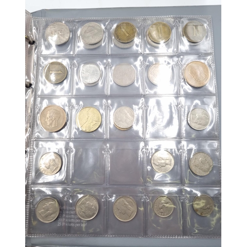 307 - Two coin albums containing antique and vintage worldwide coins