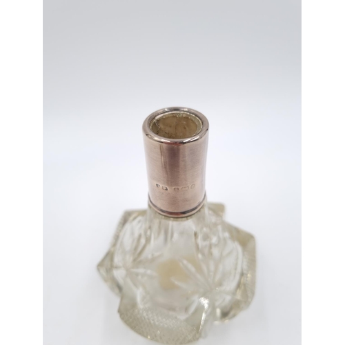 336 - A vintage cut crystal scent bottle with hallmarked sterling silver collar - approx. 16.5cm high