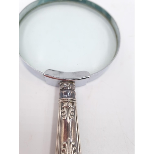 339 - A hallmarked sterling silver handled magnifying glass - approx. 17cm long x 7.5cm diameter