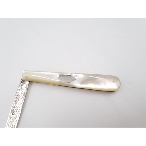 342 - A Victorian hallmarked Sheffield silver pocket knife with mother of pearl handle and silver cartouch... 