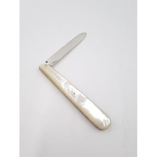 342 - A Victorian hallmarked Sheffield silver pocket knife with mother of pearl handle and silver cartouch... 