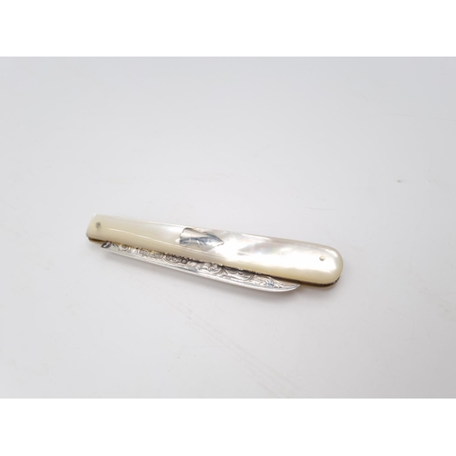 342 - A Victorian hallmarked Sheffield silver pocket knife with mother of pearl handle and silver cartouch... 