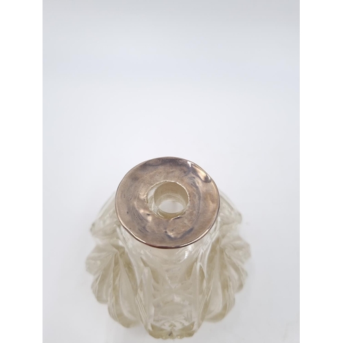 351 - An Edwardian cut glass scent bottle with hallmarked Chester silver collar, dated 1909 - approx. 10.5... 