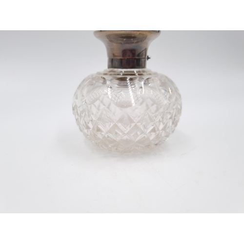 354 - A George V cut glass scent bottle with hallmarked Birmingham collar and lid, dated 1911 - approx. 8c... 