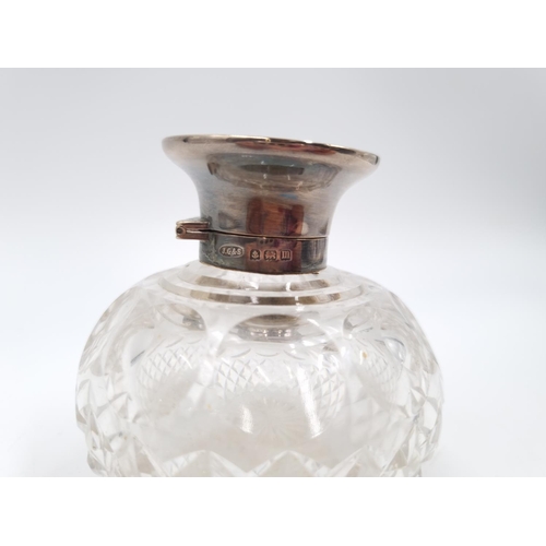 354 - A George V cut glass scent bottle with hallmarked Birmingham collar and lid, dated 1911 - approx. 8c... 