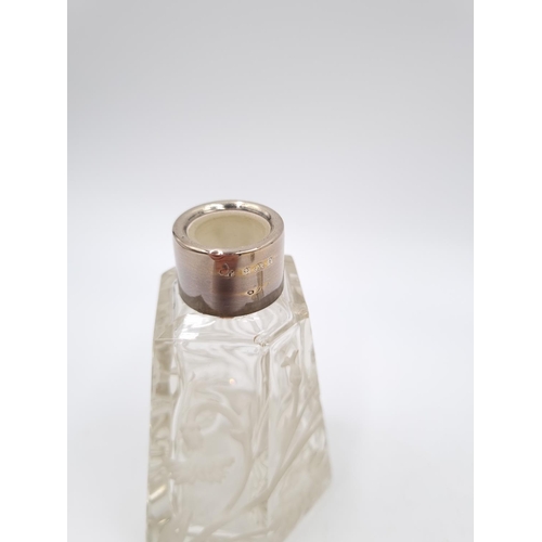 358 - Two cut glass scent bottles with hallmarked sterling silver collars - largest approx. 13cm high