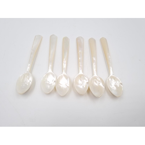 362 - A collection of antique cutlery to include Britannia Plate sugar tongs, six Art Deco mother of pearl... 