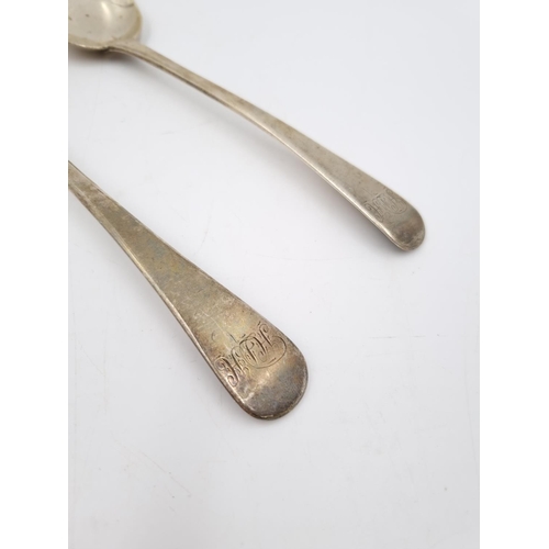 402 - A pair of George III hallmarked London silver table spoons by William Bateman, dated 1815 - approx. ... 