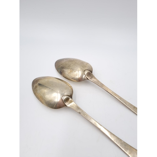 402 - A pair of George III hallmarked London silver table spoons by William Bateman, dated 1815 - approx. ... 