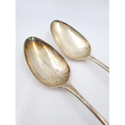 403 - Two George III hallmarked London silver table spoons, both dated 1788 - approx. gross weight 112 gra... 