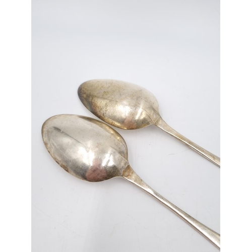 403 - Two George III hallmarked London silver table spoons, both dated 1788 - approx. gross weight 112 gra... 