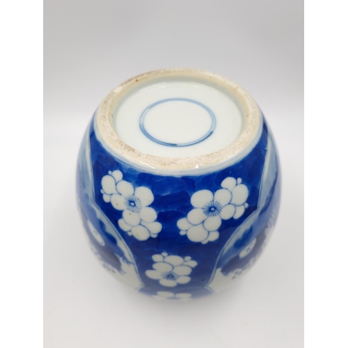 419 - A Chinese blue and white porcelain jar and cover with hardwood circular stand - approx. 20cm high ex... 