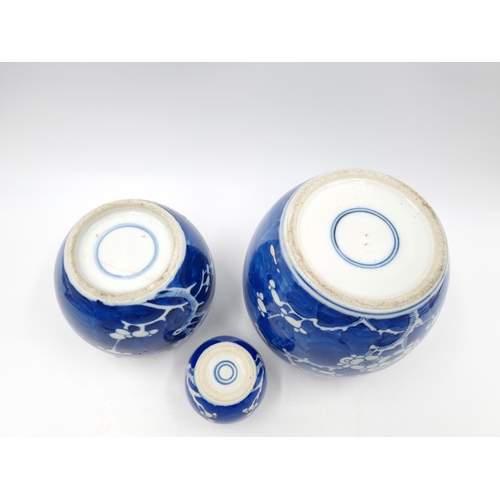 420 - Three Chinese blue and white porcelain jars and covers - largest approx. 15cm high