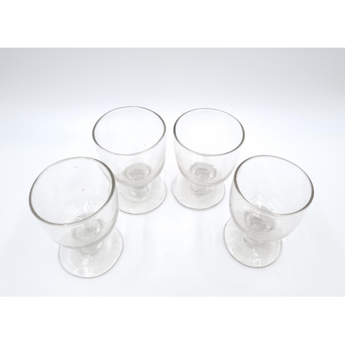 424 - A set of four 19th century hand blown drinking glasses - approx. 10cm high