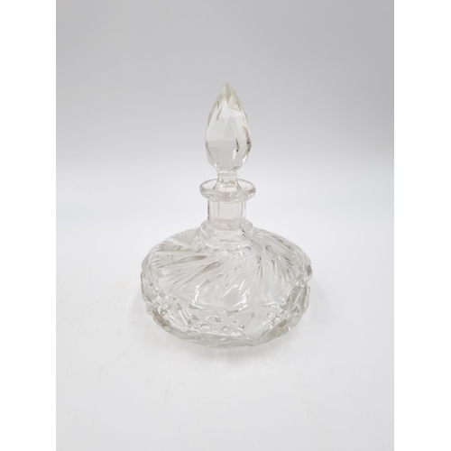 429 - Three cut glass scent bottles, one Stuart Crystal approx. 14cm high and two 11.5cm high