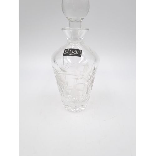 429 - Three cut glass scent bottles, one Stuart Crystal approx. 14cm high and two 11.5cm high