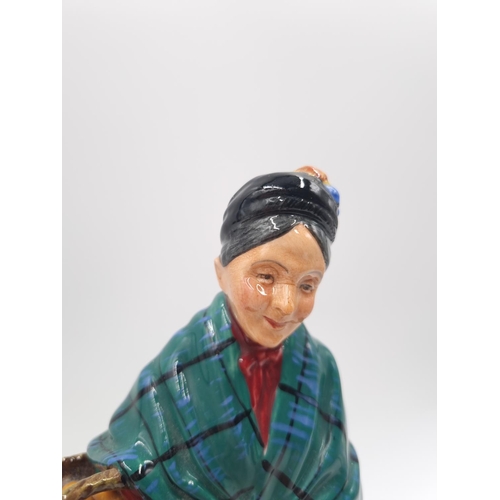 447 - A Royal Doulton The Orange Lady figurine - HN 1953