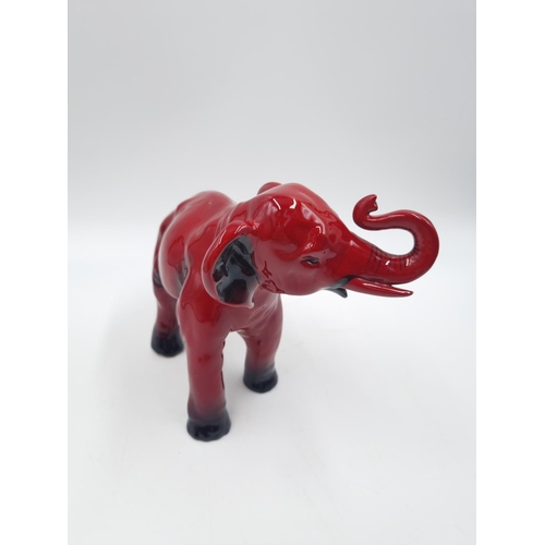 450 - A Royal Doulton Flambé elephant figurine - approx. 13.5cm x 18cm long